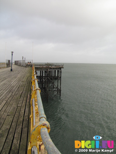 SX09930 Partially collapsed boards on Mumbles pier